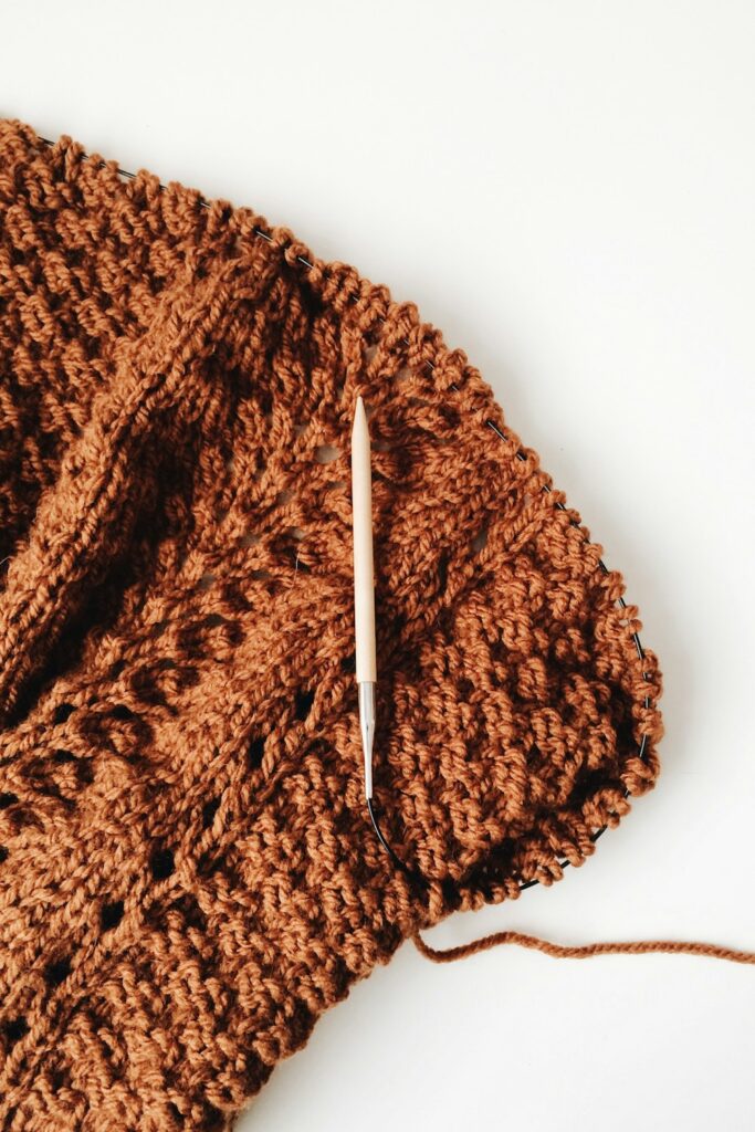 Close-up of warm brown ribbed yarn texture for an easy crochet beanie
